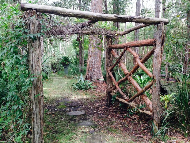 Arbour constructed from fallen trees on site