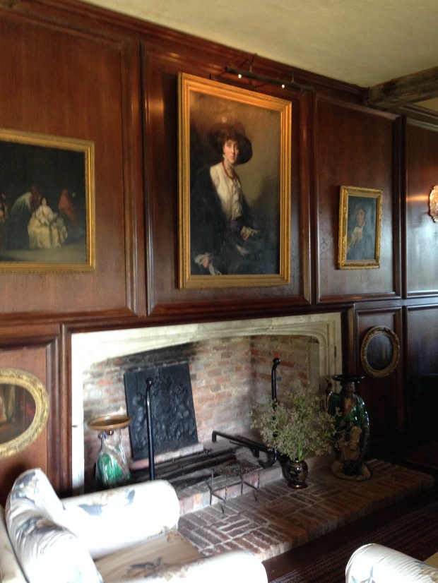 Vita Sackville-West, aged 18, above the fireplace in the Sissinghurst library
