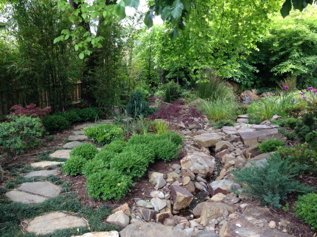 The pebble stream through the Japanese garden at Woodcote