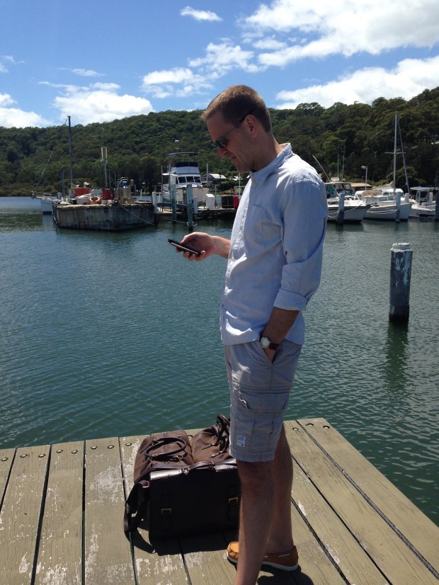 Paul checking his emails at the airport. Janna Schreier