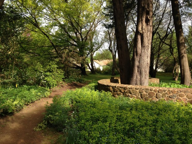 There are original Edna Walling walls and some later additions, all built with local stone to Edna's proportions