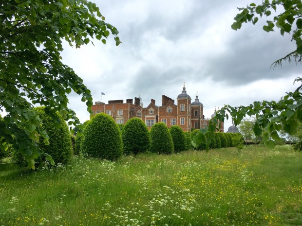The contrast of topiary and meadow at Hatfield House