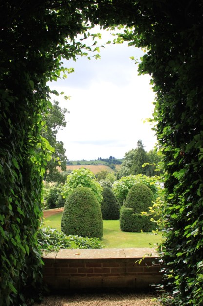 This back drop to the walled garden at Broughton Grange is a significant part of its charm